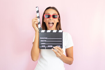 video recording influencer woman holding clapboard film action concept director scene action cinema movie making - obrazy, fototapety, plakaty