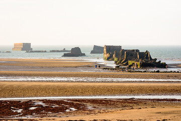 Remains of Phoenix caissons in Asnelles, France, used to build the artificial Mulberry harbour on...
