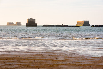 Remains of Phoenix caissons in Asnelles, France, used to build the artificial Mulberry harbour on...