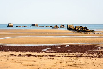 Remains of Phoenix caissons in Asnelles, France, used to build the artificial Mulberry harbour on Gold Beach after the Normandy landings in World War II.