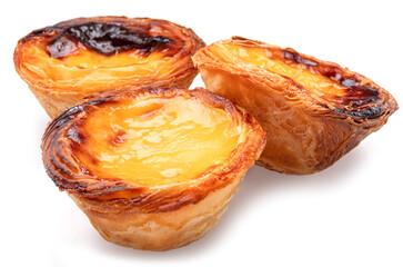 Pastel de nata tarts isolated on white background.