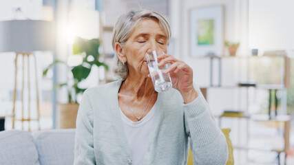 Wellness, home or healthy old woman drinking water for healthcare or natural vitamins in a house....