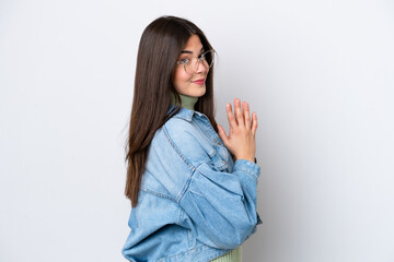 Young Brazilian woman isolated on white background scheming something