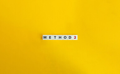 Method 2 Banner. Block Letter Tiles on Yellow Background..