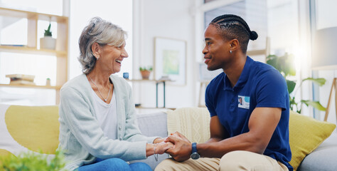 Black man, caregiver or old woman holding hands for support consoling or empathy in therapy. Medical healthcare advice, senior person or male nurse nursing, talking or helping elderly patient.