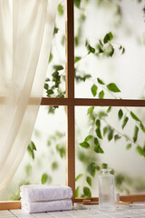 A window view of green leaves in the afternoon
sunlight.