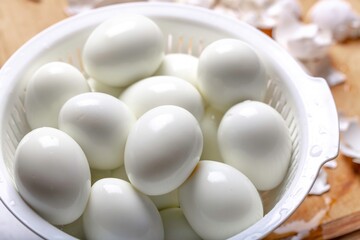 Hard Boiled Unpeeled Eggs on Wooden Table - 4k Image