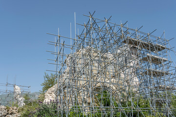 metallic reinforcement after earhquake destruction, Amatrice, Italy