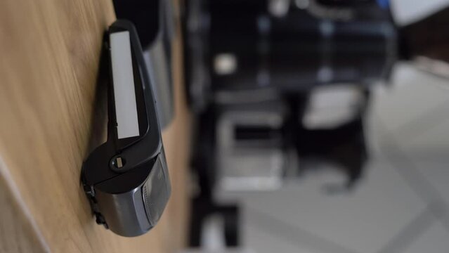 Close-up of Customer stands near bar counter make payment use contactless credit card, cashless method pay bills.