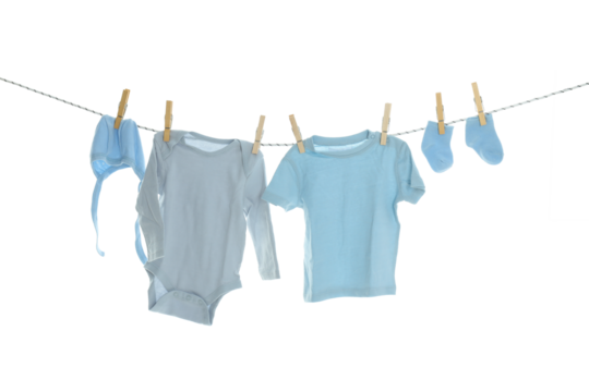 PNG line drying baby clothes isolated on white background.