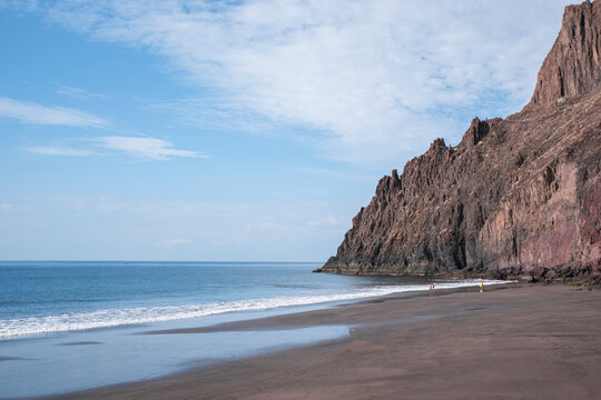 La playa de las Gaviotas, popular nudist and surf beach with black volcanic sand in Tenerife near de San Andres