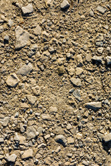 Aggregate as hardening of a dirt road - texture. - 653185640