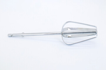 A stirrer or whisk is a cooking tool that functions to mix dough ingredients perfectly, isolated on white