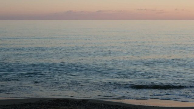 Winter Mediterranean Sea at sunset at Lara Beach, Kundu, Antalya, Turkey.