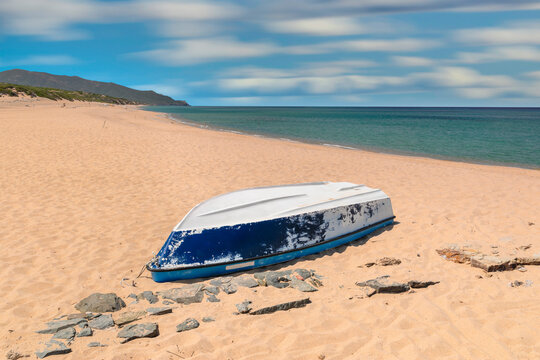 Upturned boat on Scivu beach, Arbus, Sud Sardegna district, Sardinia, Italy, Mediterranean