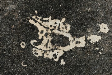 footprint on the asphalt