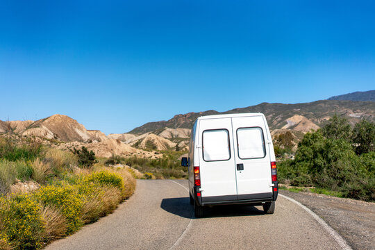 Camper van on Tabernas desert on a sunny day, Almeria, Andalusia