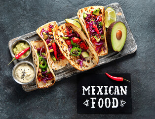 Mexican street tacos flat lay composition with lime, pepper and sauce