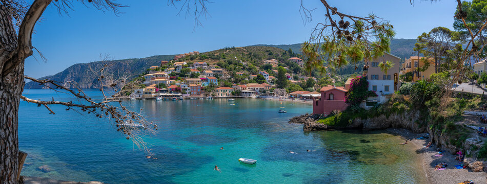 View of harbour and colourful houses in Assos, Assos, Kefalonia, Ionian Islands, Greek Islands