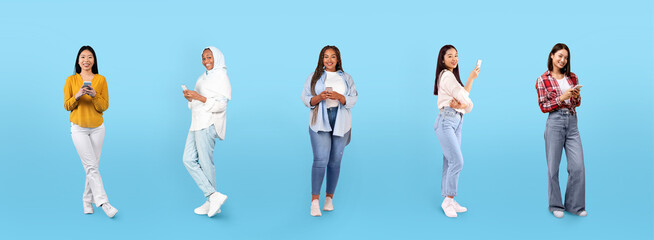 Cheerful young black, arab, asian women in casual chatting on smartphones