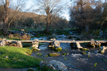 Stone bridge over the Moralina stream in the Arribes del Duero - obrazy, fototapety, plakaty