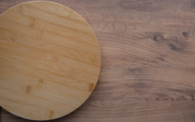 Top view of empty kitchen trendy rustic wooden board on the wooden background. Copy space for text. Food and menu background.