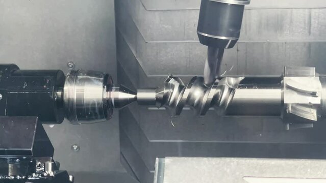 Multi-axis CNC machine with end mill cutter while machining forming metal workpiece material to screw shape threads.