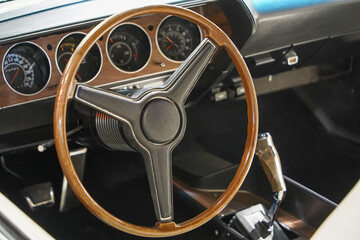 Image of Wooden interior of antique luxury car. Retro feel photographic effect