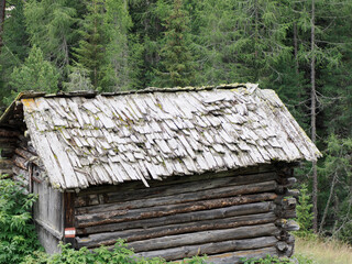 Old wooden shingles on a hut roof mountain wooden hut roof detail