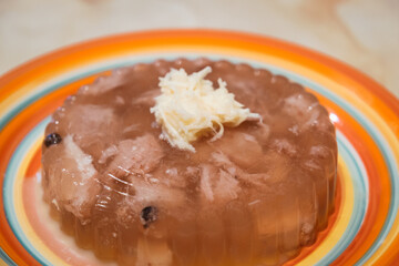 Meat jelly is thick jelly-like dish from meat broth with garlic and spices