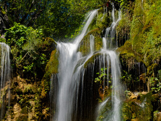 Fototapeta na wymiar Summer view of water lakes and beautiful waterfalls in Plitvice Lakes National Park, Croatia