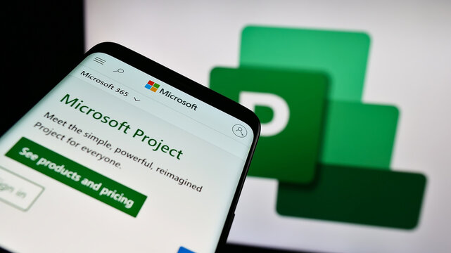 Stuttgart, Germany - 09-21-2023: Mobile phone with website of project management software Microsoft Project on screen in front of logo. Focus on top-left of phone display.