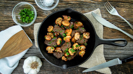 Balsamic glazed  beef sirloin steak tips and baby bella mushrooms from above from directly above 