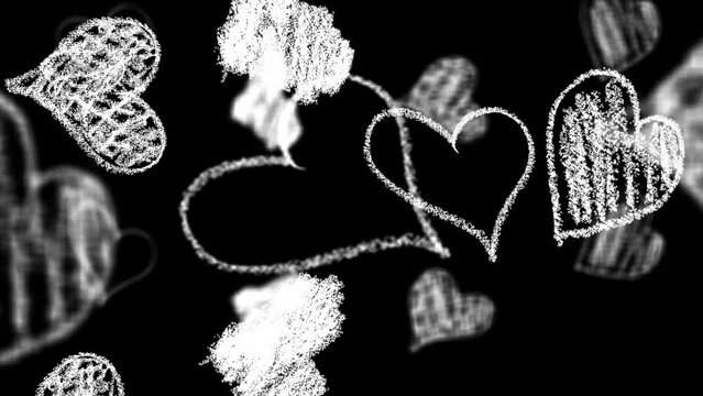Hand drawn hearts isolated on a black background. looping hearts in cartoon doodle style. White hearts for Valentine's Day.