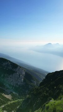 Flying over the mountains and Garda Lake in italy