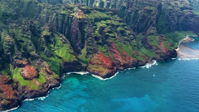 Aerial towering Pali sea cliffs Kalalau Trail Kauai 