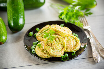 Fried squash green pancakes in a plate.