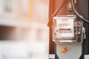 Electric power meter measuring power usage. Watt hour electric meter measurement tool at pole