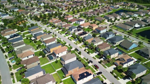 Florida Neighborhood Subdivision Fly Above Towards Pool - Afternoon