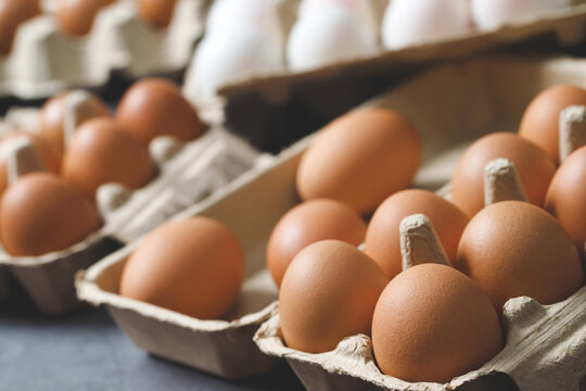 fresh chicken eggs for sale at a market. pattern background.