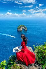 Tourist enjoying Banah cliff at nusa penida island, bali, Indonesia.