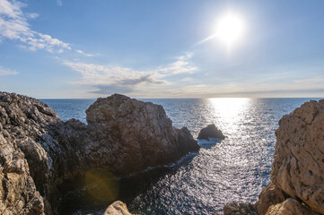 Punta Nati Lighthouse in Menorca, Spain. - 653294625