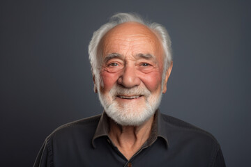 A picture of a man with a white beard wearing a black shirt. This versatile image can be used to represent various concepts and themes.