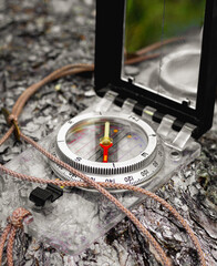Outdoor hiking compass in forest