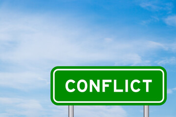 Green color transportation sign with word conflict on blue sky with white cloud background