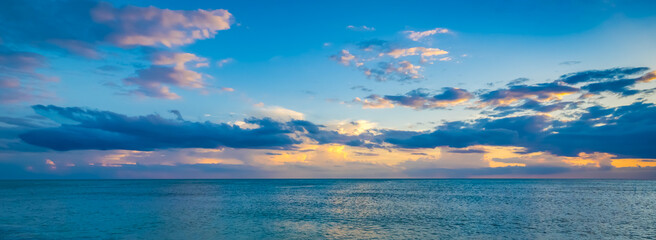 Fototapeta na wymiar Late afternoon sky over the Gulf of Mexico from Venice Beach in Venice Florida USA