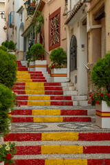 Fototapeta na wymiar Spanish Flag Steps, landmark and tourist attraction in Calpe, Spain