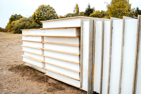 Building construction of wooden frame house made of SIP structural insulated panels. OSB oriented strand board, EPS expanded polystyrene. Energy-efficient eco-friendly green Canadian technology