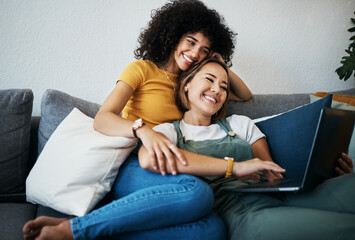 Lgbtq, laptop and couple relax on sofa for watching movies, streaming series and online videos....