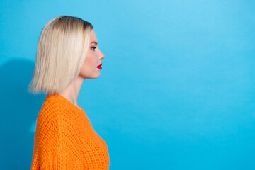 Side profile photo of lovely girlish woman with bob hairdo dressed knitwear sweater look empty...